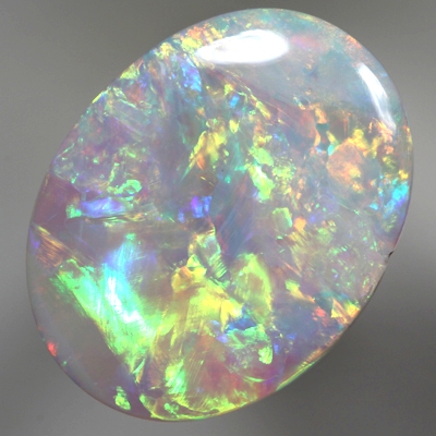 SOLID SEMI BLACK OPAL Bright rolling flashes. SEE VIDEO